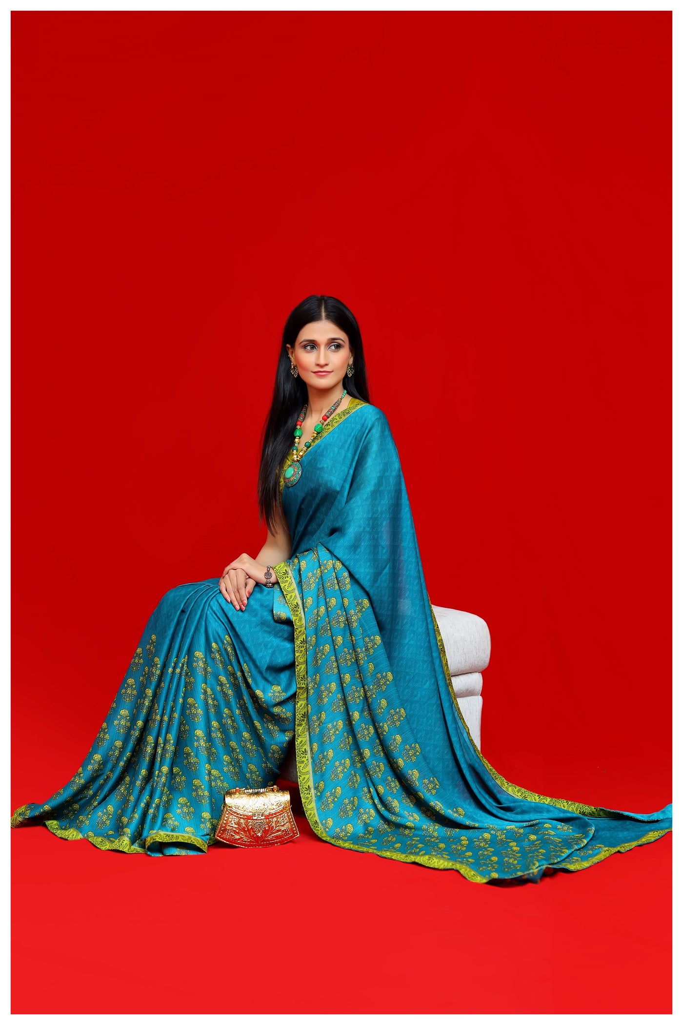 Teal Green Georgette Silk Saree